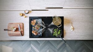 Dunstabzug im Neubau Bora x Pure Kochfeld mit Muldenluefter matt Steak